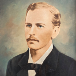 A painted portrait of a man with light brown hair, a mustache, and blue eyes, wearing a black suit, white shirt, and black bow tie, set against a soft, muted background.